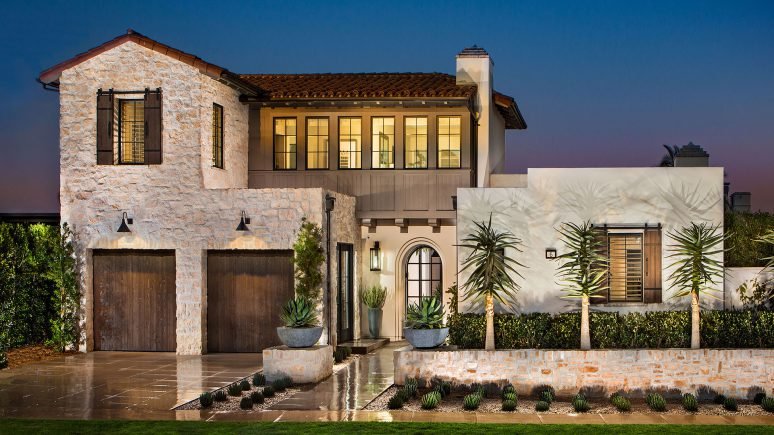 Rhinestone rubble natural stone thin veneer installed on exterior walls of custom built home.