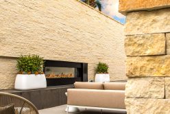 Camilla Neo Ledge: Split thin veneer installed on a exterior wall with fireplace