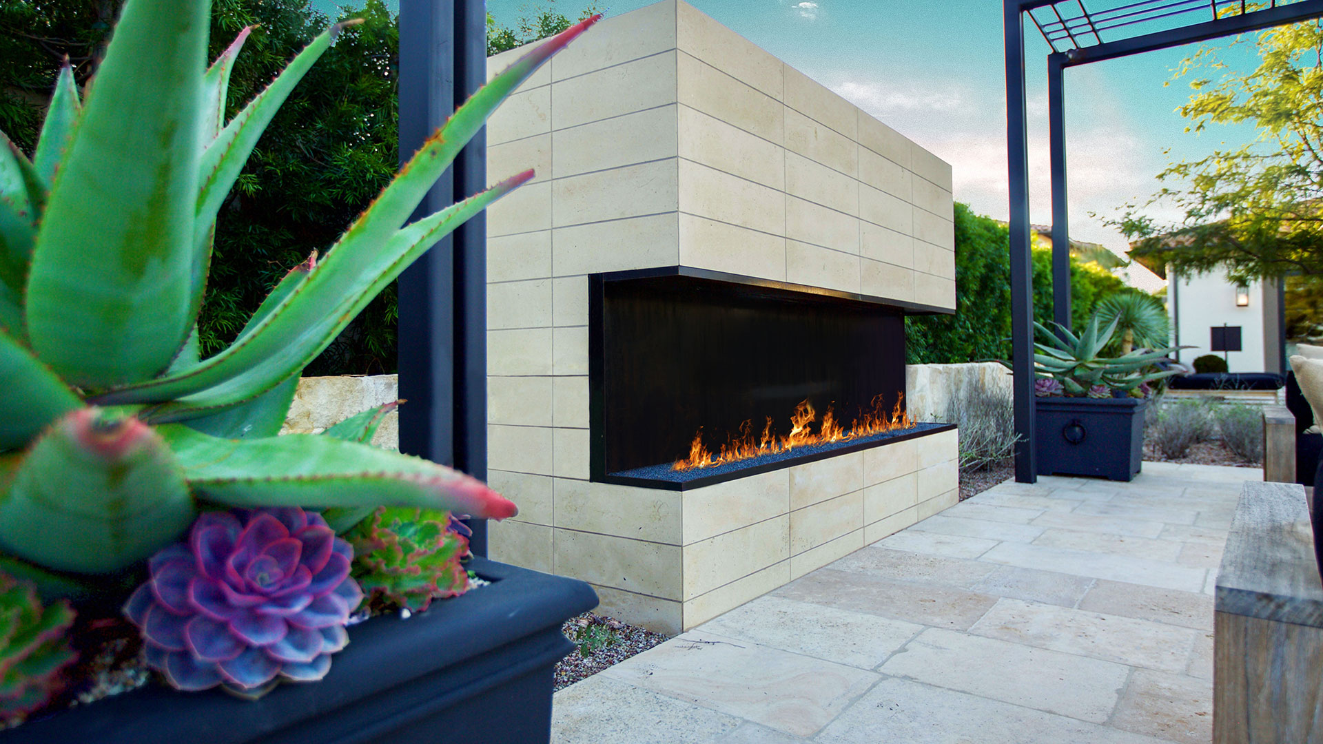 Nadia Neo Planks natural stone thin veneer installed on outdoor gas fireplace