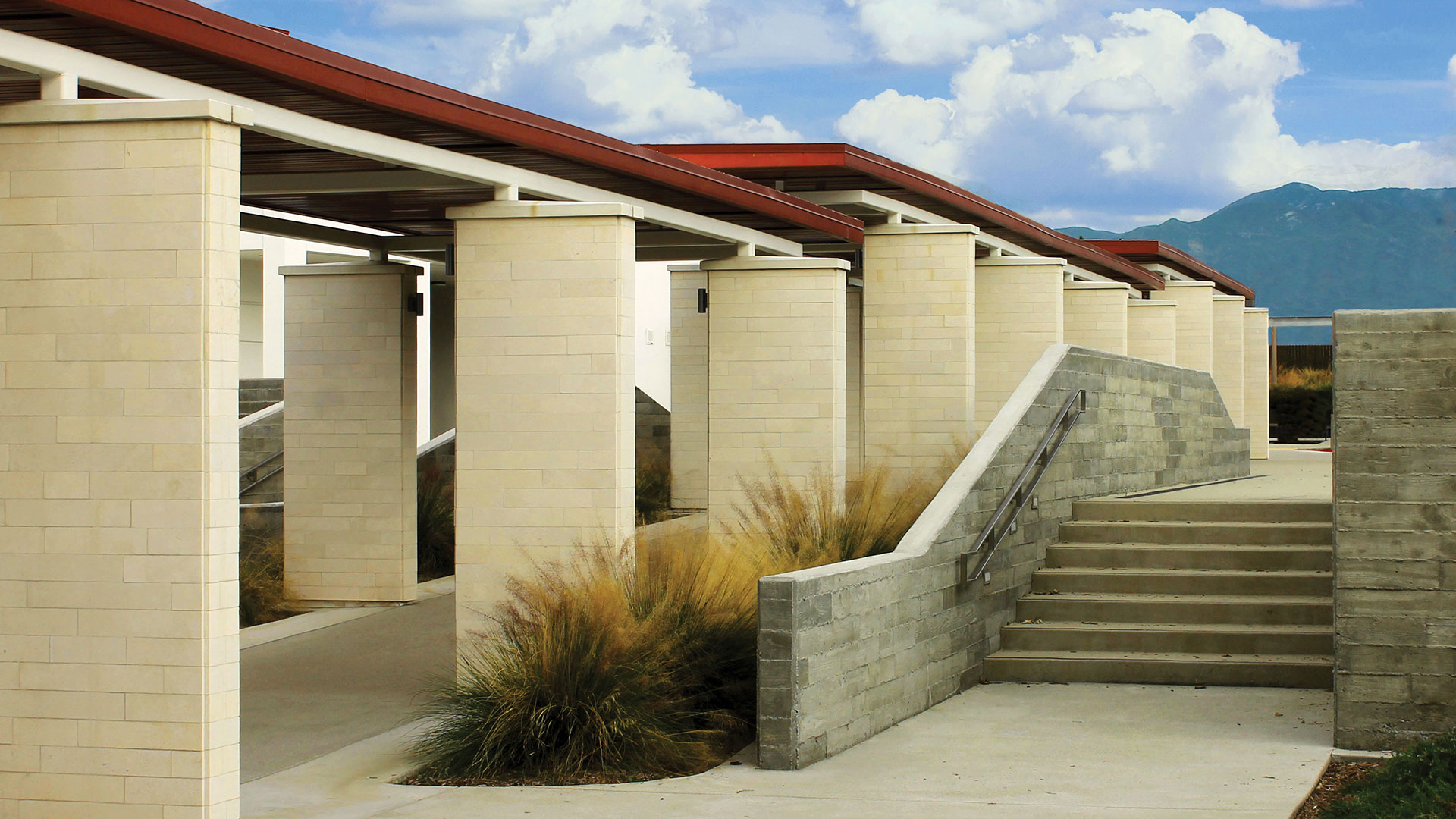 Stella Neo Planks natural stone thin veneer installed on exterior walls and columns of school