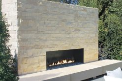Nadia Pillowed Ledge natural stone thin veneer install on outdoor fireplace