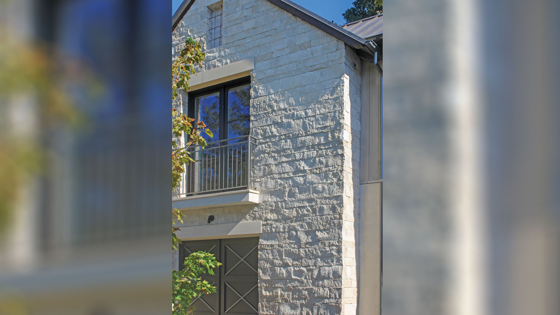 home with nadia pillowed ledge thin veneer installed on exterior walls