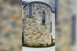 Cottage Cream Rubble natural stone thin veneer installed on exterior walls of custom home
