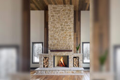Regent Buff Rubble natural stone thin veneer installed on interior fireplace.