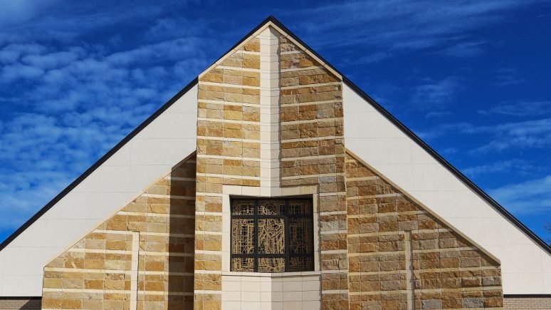 archaic traditional thin veneer installed on exterior walls of building