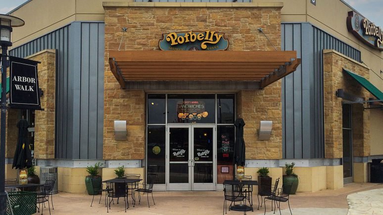 front of commercial restaurant with copper canyon thin veneer installed around door and windows