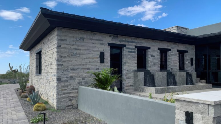 Mission Blue Traditional natural stone thin veneer installed on exterior of custom home.