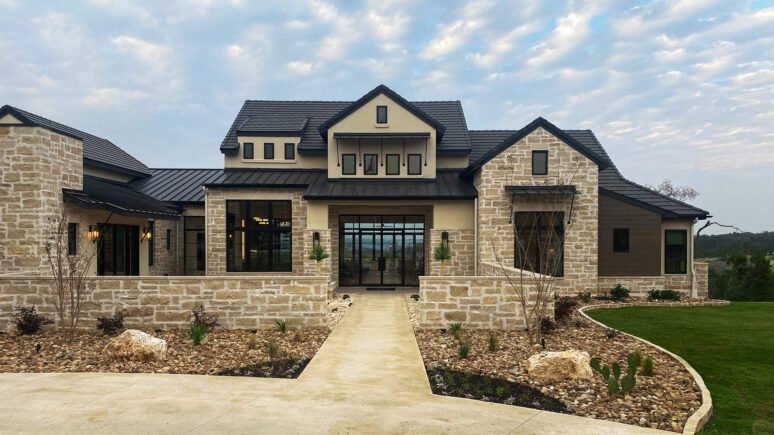 Regent Buff Traditional natural stone thin veneer installed on the exterior of a custom home.