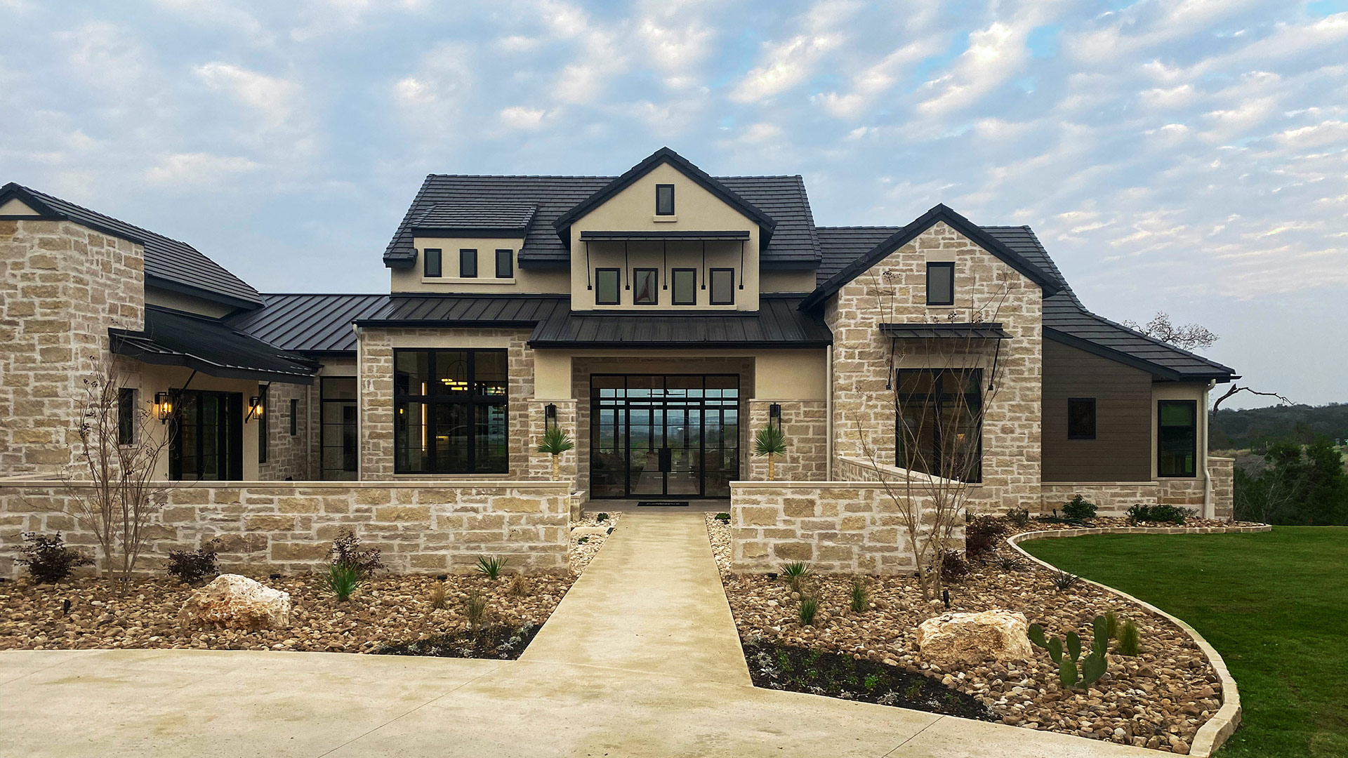 Regent Buff Traditional natural stone thin veneer installed on the exterior of a custom home.