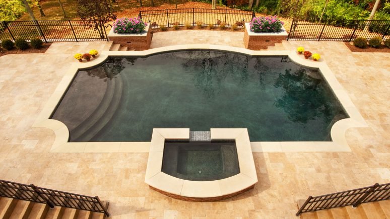 overlooking pool with Van Buren travertine installed around pool.