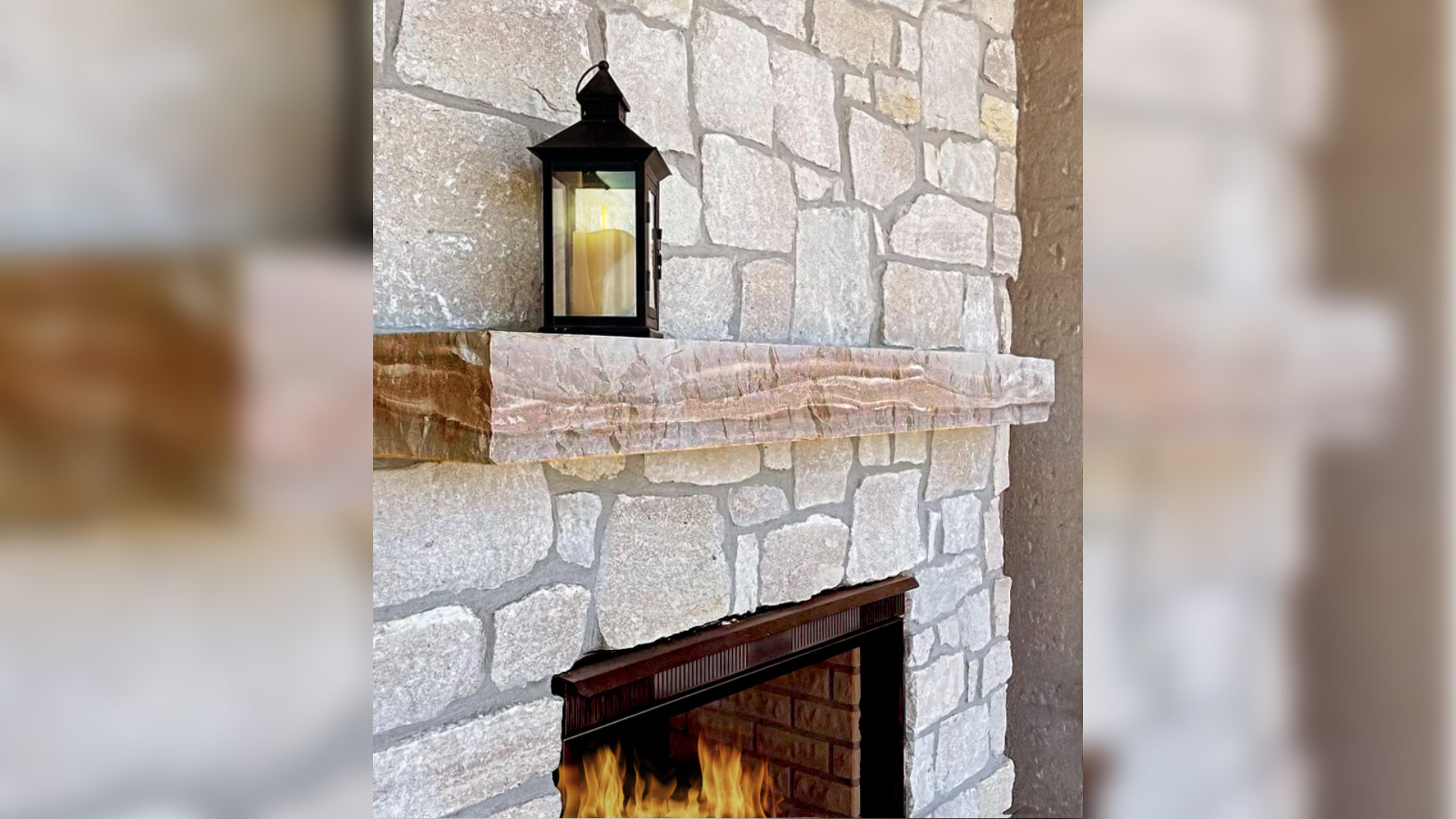 Tundra Cream Rubble natural stone thin veneer installed on fireplace.