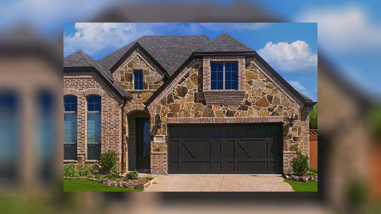front of home with ashwood rubble custom profile natural stone thin veneer installed on exterior