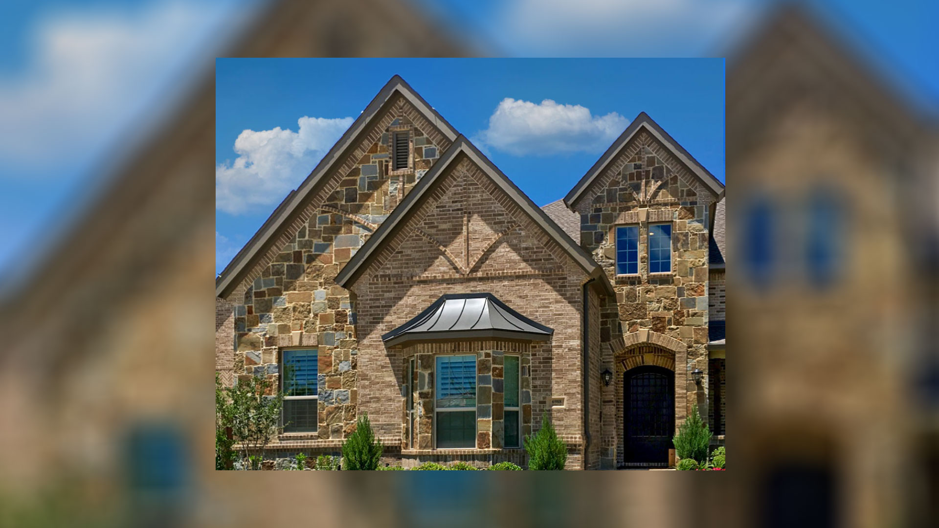front of home with montana blend rubble custom profile natural stone thin veneer installed on exterior of home