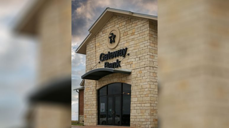 front of bank with khaki traditional natural stone thin veneer custom profile installed on exterior walls