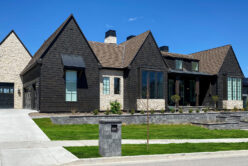 Tundra Cream Rubble natural stone thin veneer installed on exterior of custom home.