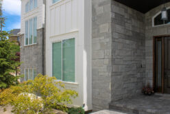 Mission Blue Traditional natural stone thin veneer installed on exterior of custom home.